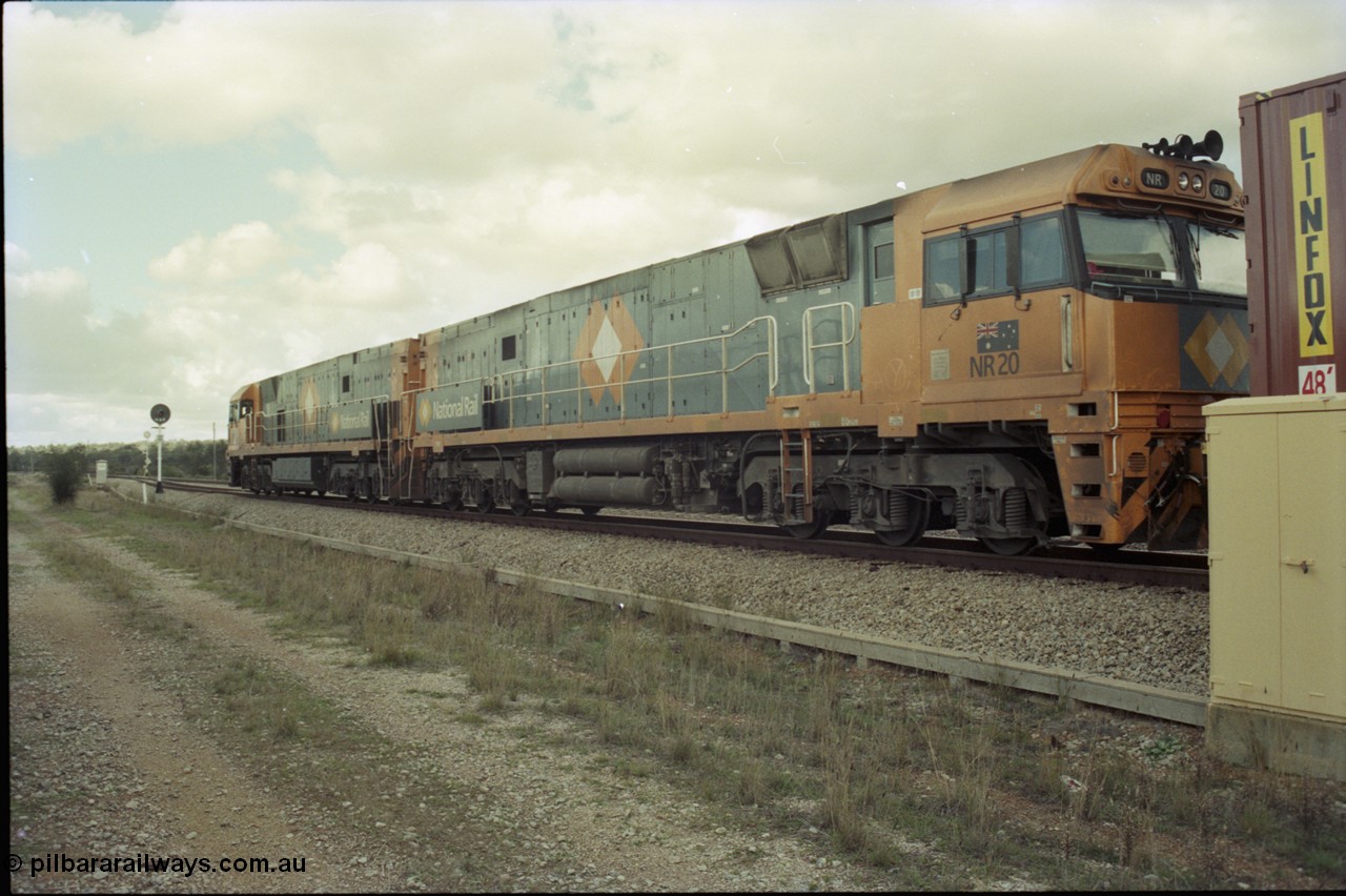 199-08
Meckering, National Rail NR class units NR 19 and NR 20 both being Goninan built GE Cv40-9i models head up train 7PM5 as they wait for a cross with the Prospector in the loop 1400 hrs 21st June 1997.
Keywords: NR-class;NR20;Goninan;GE;CV40-9i;7250-04/97-222;