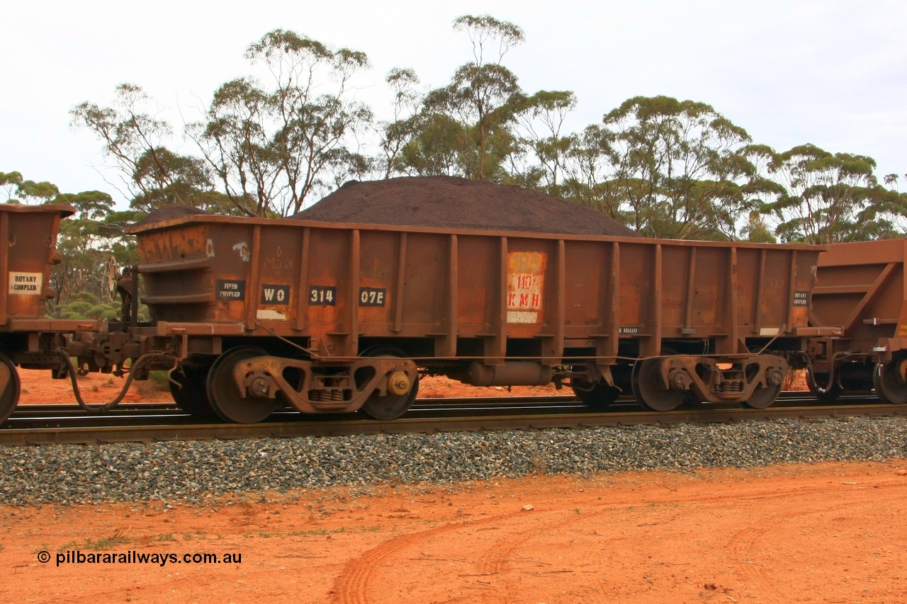 100605 9327
WO type iron ore waggon WO 31407 is one of a batch of eleven replacement waggons built by WAGR Midland Workshops between 1970 and 1971 with fleet number 185 for Koolyanobbing iron ore operations, with a 75 ton and 1018 ft³ capacity. This unit was converted to WOC for coal in 1986 till 1994 when it was re-classed back to WO, Binduli Triangle, loaded with fines, 5th June 2010.
Keywords: WO-type;WO31407;WAGR-Midland-WS;