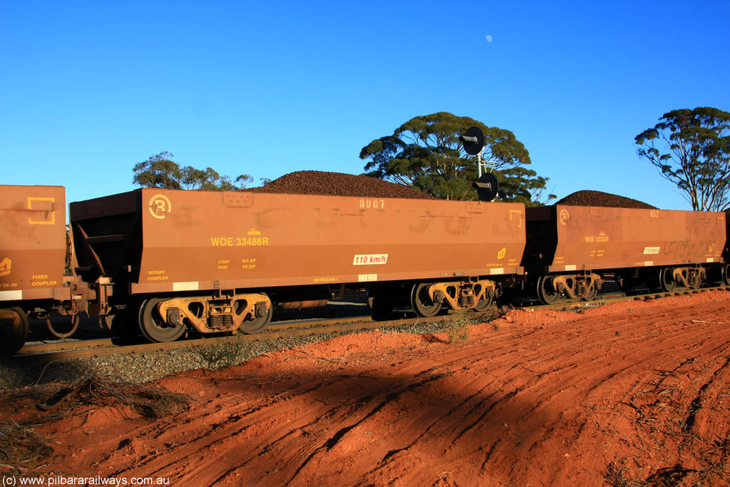 100731 02292
WOE type iron ore waggon WOE 33486 is one of a batch of one hundred and twenty eight built by United Group Rail WA between August 2008 and March 2009 with serial number 950211-??? and fleet number 8987 for Koolyanobbing iron ore operations, on loaded train 6413 at Binduli Triangle, 31st July 2010.
Keywords: WOE-type;WOE33486;United-Group-Rail-WA;