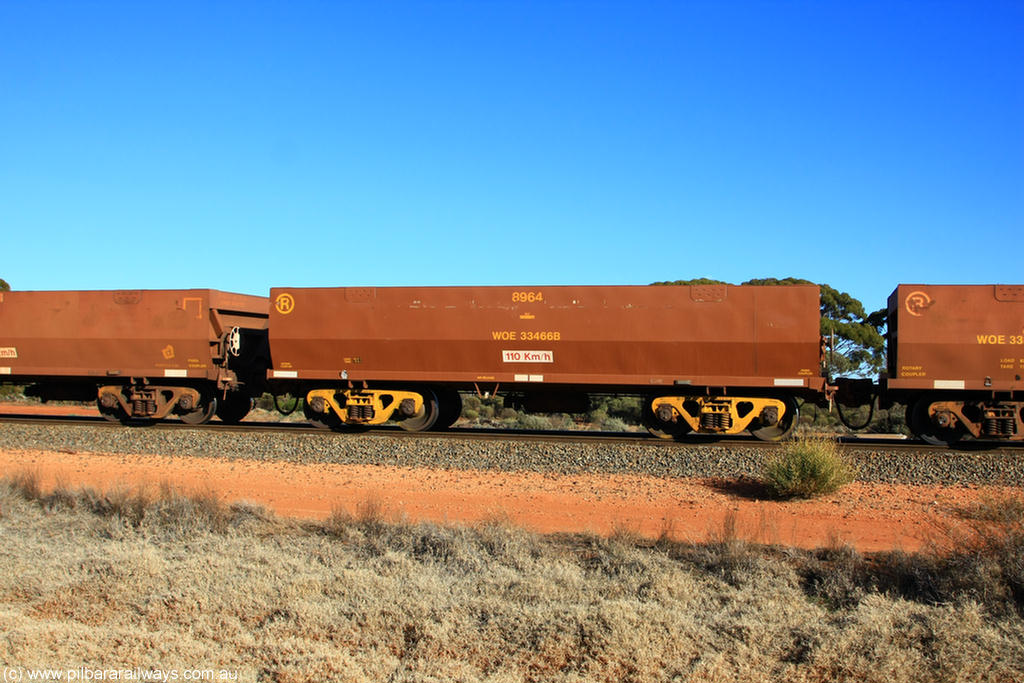 100731 02431
WOE type iron ore waggon WOE 33466 is one of a batch of one hundred and twenty eight built by United Group Rail WA between August 2008 and March 2009 with serial number 950211-008 and fleet number 8964 for Koolyanobbing iron ore operations, on empty train 6418 at Binduli Triangle, 31st July 2010.
Keywords: WOE-type;WOE33466;United-Group-Rail-WA;950211-008;