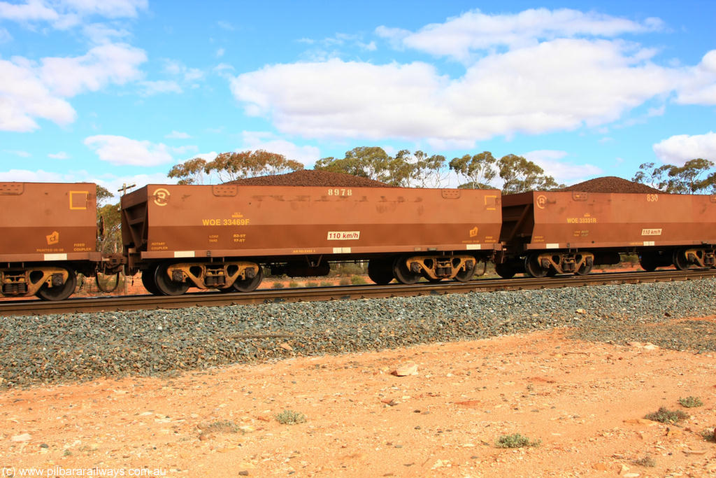 100731 02844
WOE type iron ore waggon WOE 33469 is one of a batch of one hundred and twenty eight built by United Group Rail WA between August 2008 and March 2009 with serial number 950211-011 and fleet number 8978 for Koolyanobbing iron ore operations, on loaded train 7415 at Binduli Triangle, 31st July 2010.
Keywords: WOE-type;WOE33469;United-Group-Rail-WA;950211-011;
