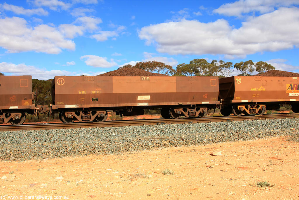 100731 02862
WOE type iron ore waggon WOE 31117 is one of a batch of one hundred and thirty built by Goninan WA between March and August 2001 with serial number 950092-107 and fleet number 700 for Koolyanobbing iron ore operations, on loaded train 7415 at Binduli Triangle, 31st July 2010.
Keywords: WOE-type;WOE31117;Goninan-WA;950092-107;