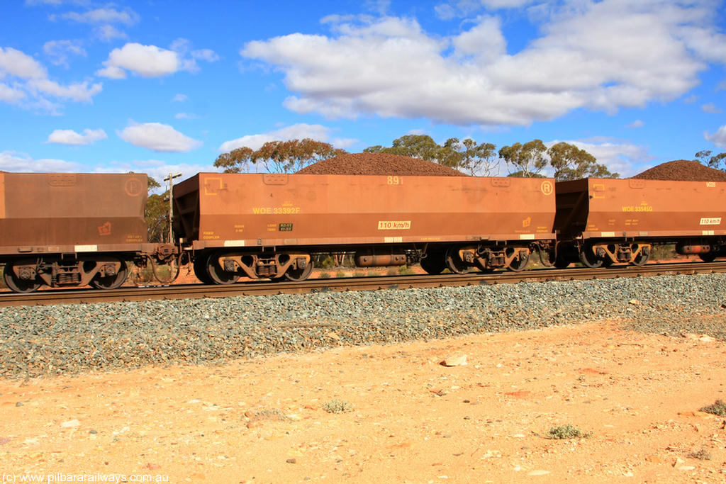 100731 02917
WOE type iron ore waggon WOE 33392 is one of a batch of one hundred and forty one built by United Group Rail WA between November 2005 and April 2006 with serial number 950142-097 and fleet number 891 for Koolyanobbing iron ore operations, on loaded train 7415 at Binduli Triangle, 31st July 2010.
Keywords: WOE-type;WOE33392;United-Group-Rail-WA;950142-097;