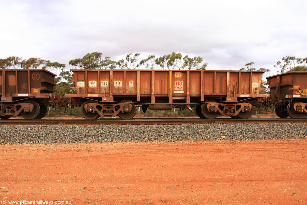 100822 5954
WO type iron ore waggon WO 31235 is one of a batch of sixty two built by Goninan WA between April and August 2000 with serial number 950086-005 and fleet number 127 for Koolyanobbing iron ore operations, and is a Goninan built replacement WO type waggon that replaces the original WAGR built WO type waggon with the newer style WOD type and has square features opposed to the curved ones as on the original WO class, Binduli Triangle 22nd August 2010.
Keywords: WO-type;WO31235;Goninan-WA;950086-005;
