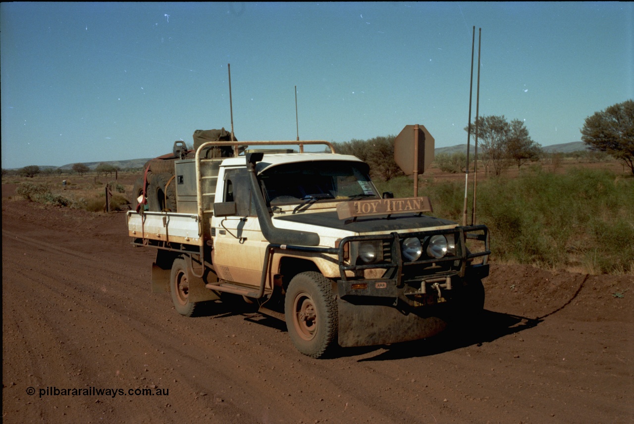 195-02
Munjina, end of Roy Hill Road where it meets the Great Northern Highway, Toyota HJ75 Landcruiser, loaded up to the max, it has a 13 leaf spring pack on the rear, 9 on the front, PTO winch, in route to Wittenoom.
