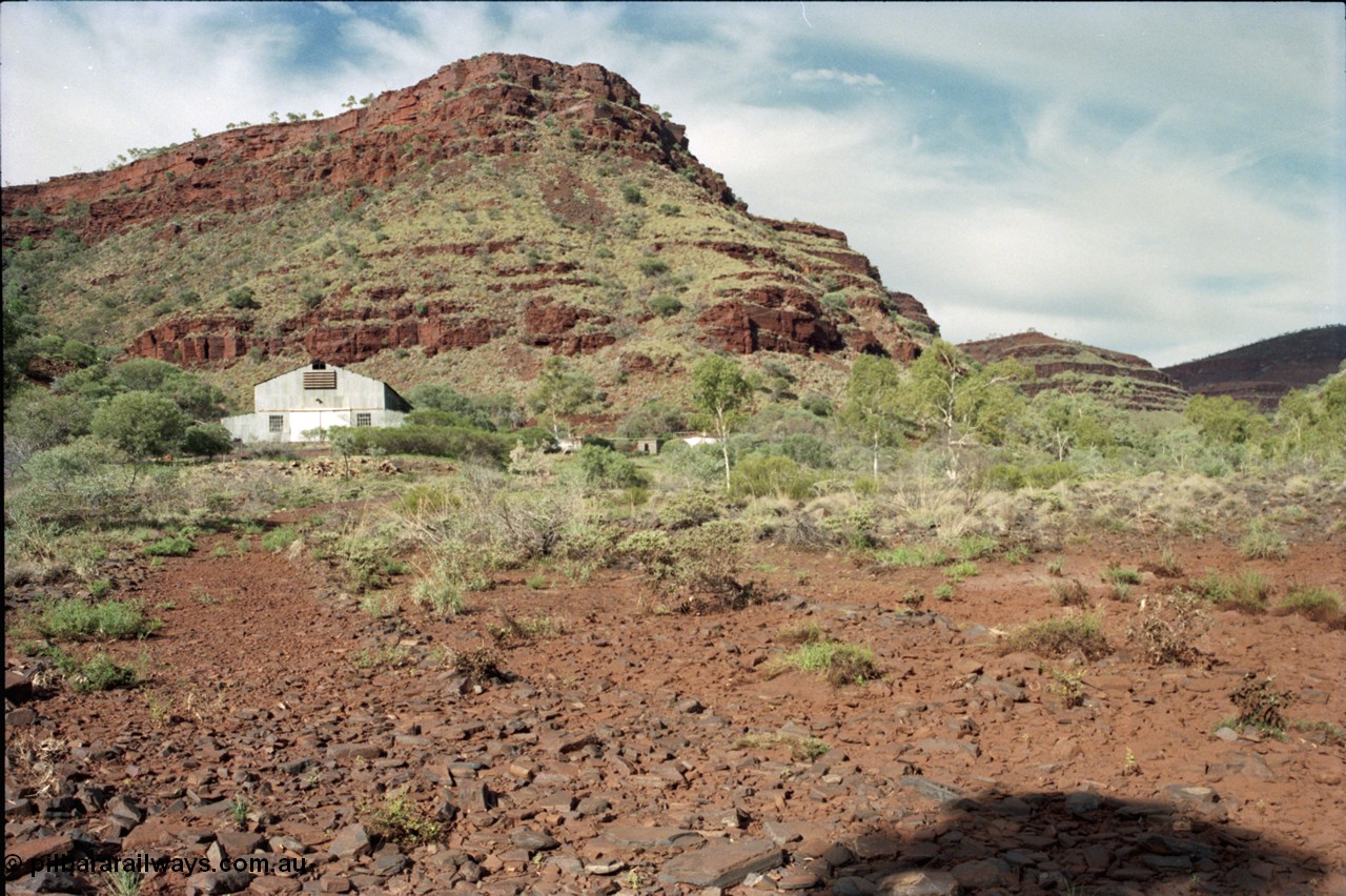 196-18
Wittenoom Gorge, view from Joffre Creek looking at the power station generator hall, the Gorge Mine is located further up Wittenoom Gorge to the right towards Karijini National Park.
