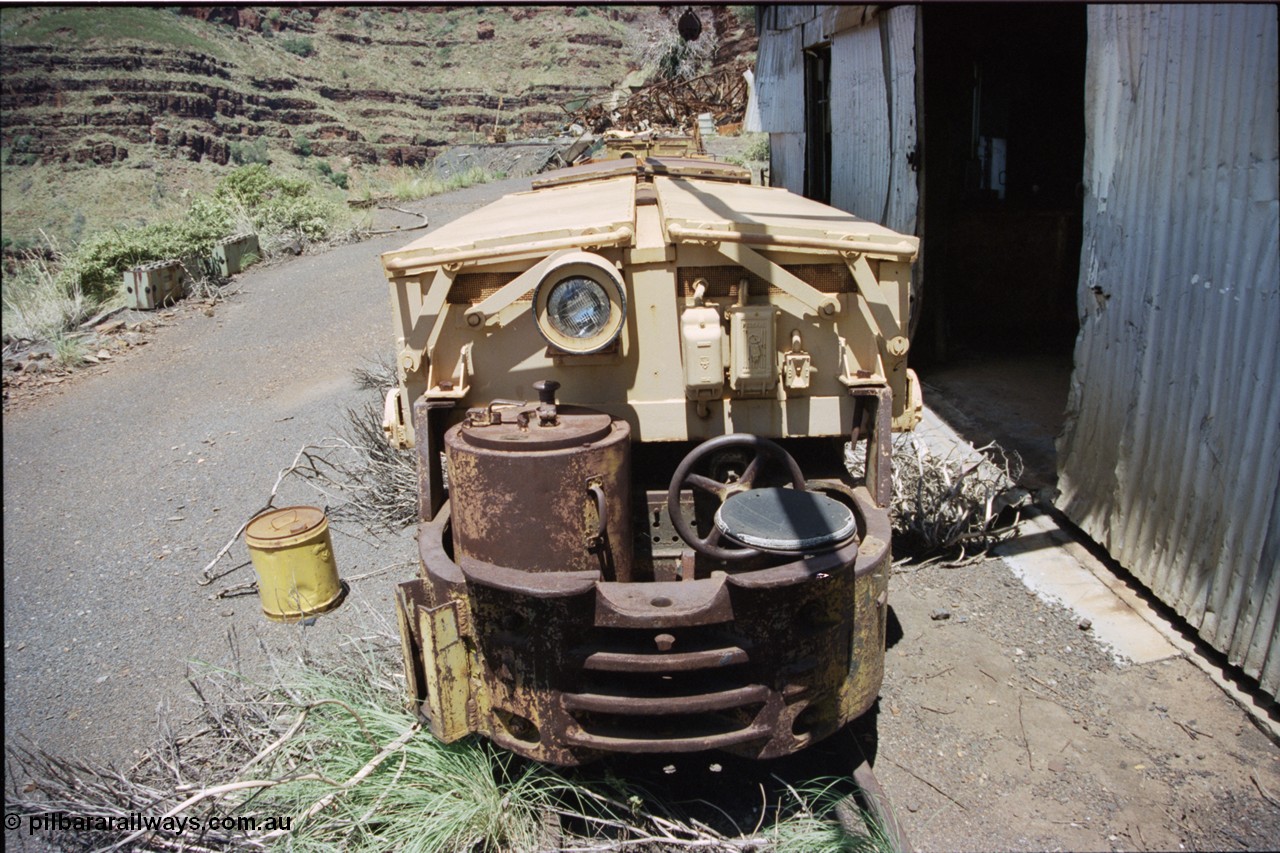 197-31
Wittenoom, Colonial Mine, front view of Mancha battery locomotive, view of drivers seat, brake wheel, controller and battery module.
Keywords: Mancha;