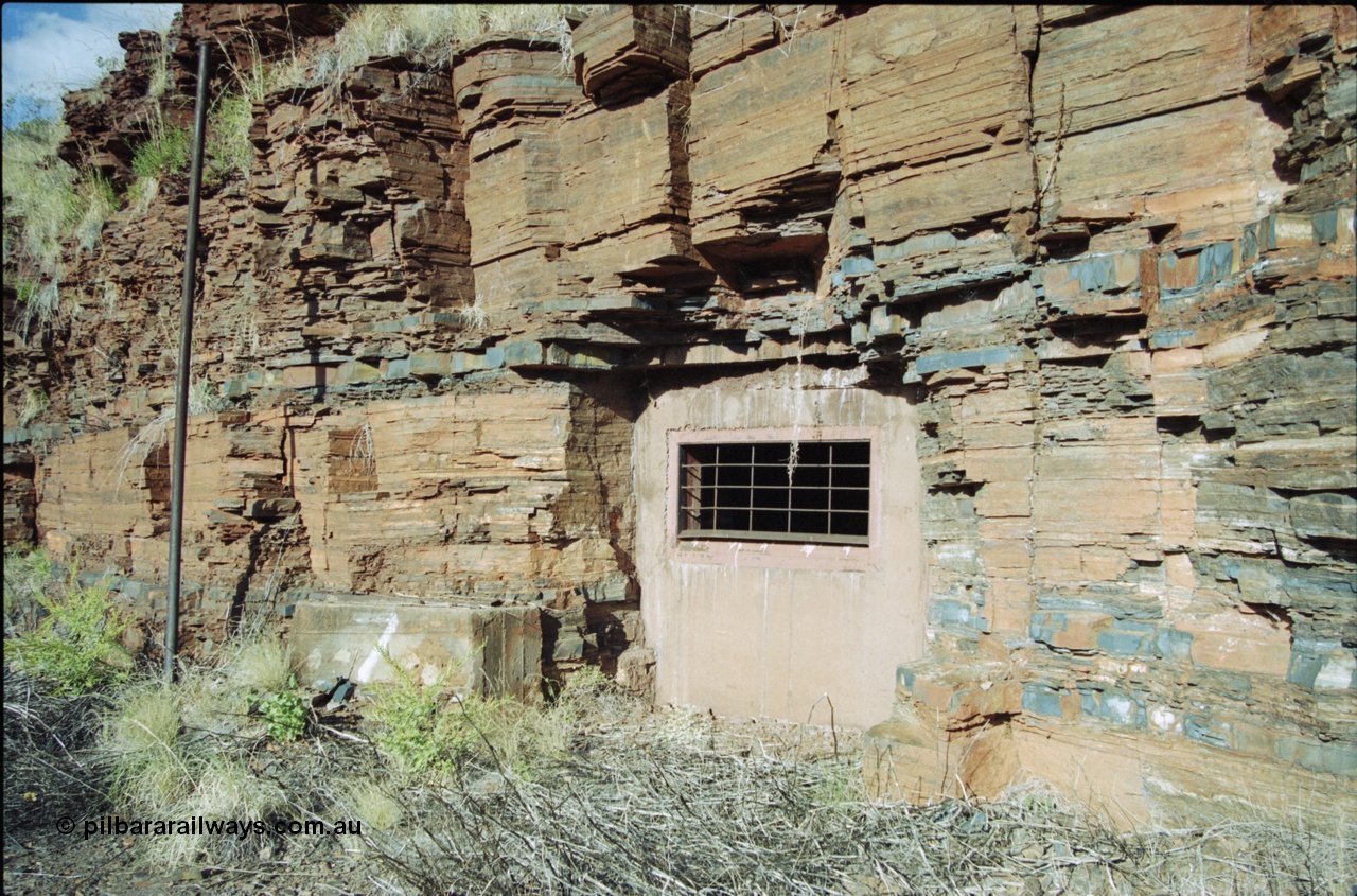 204-00
Yampire Gorge, remains of asbestos mining, sealed up drive entry No. 7.
