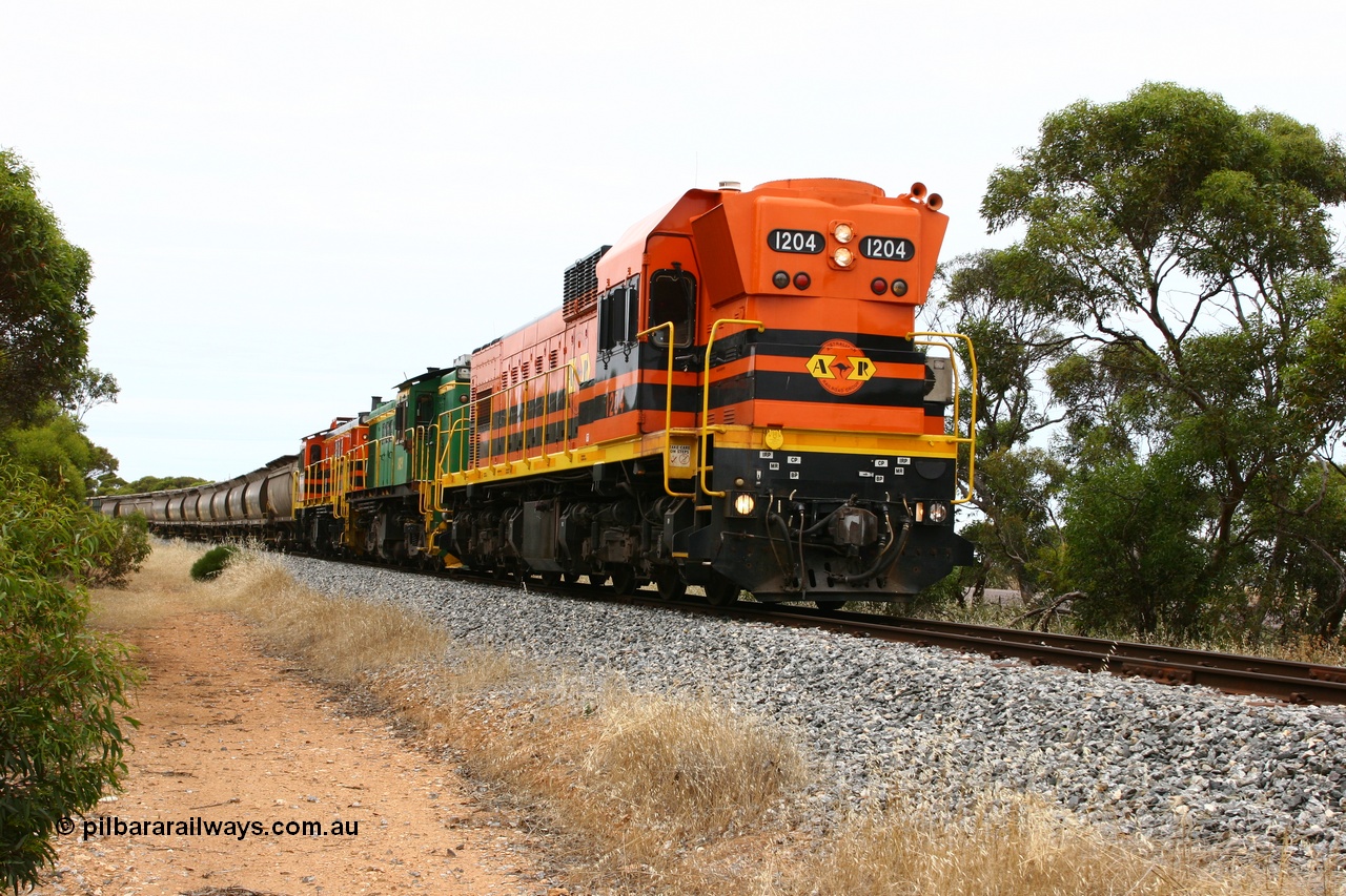 060110 2159
Near the 64 km between Pillana and Cummins, empty grain train behind ARG 1200 class unit 1204, a Clyde Engineering EMD model G12C serial 65-428, originally built for the WAGR as the final unit of fourteen A class locomotives in 1965 then sent to the Eyre Peninsula in July 2004, and two 830 class AE Goodwin built ALCo model DL531 units 842 serial 84140 ex SAR broad gauge to Eyre Peninsula in October 1987, and 851 serial 84137 new to Eyre Peninsula in 1962. [url=https://goo.gl/maps/NECDZnDkLfv]Approx. location of photo[/url].
Keywords: 1200-class;1204;Clyde-Engineering-Granville-NSW;EMD;G12C;65-428;A-class;A1514;830-class;842;851;AE-Goodwin;ALCo;DL531;84137;84140;
