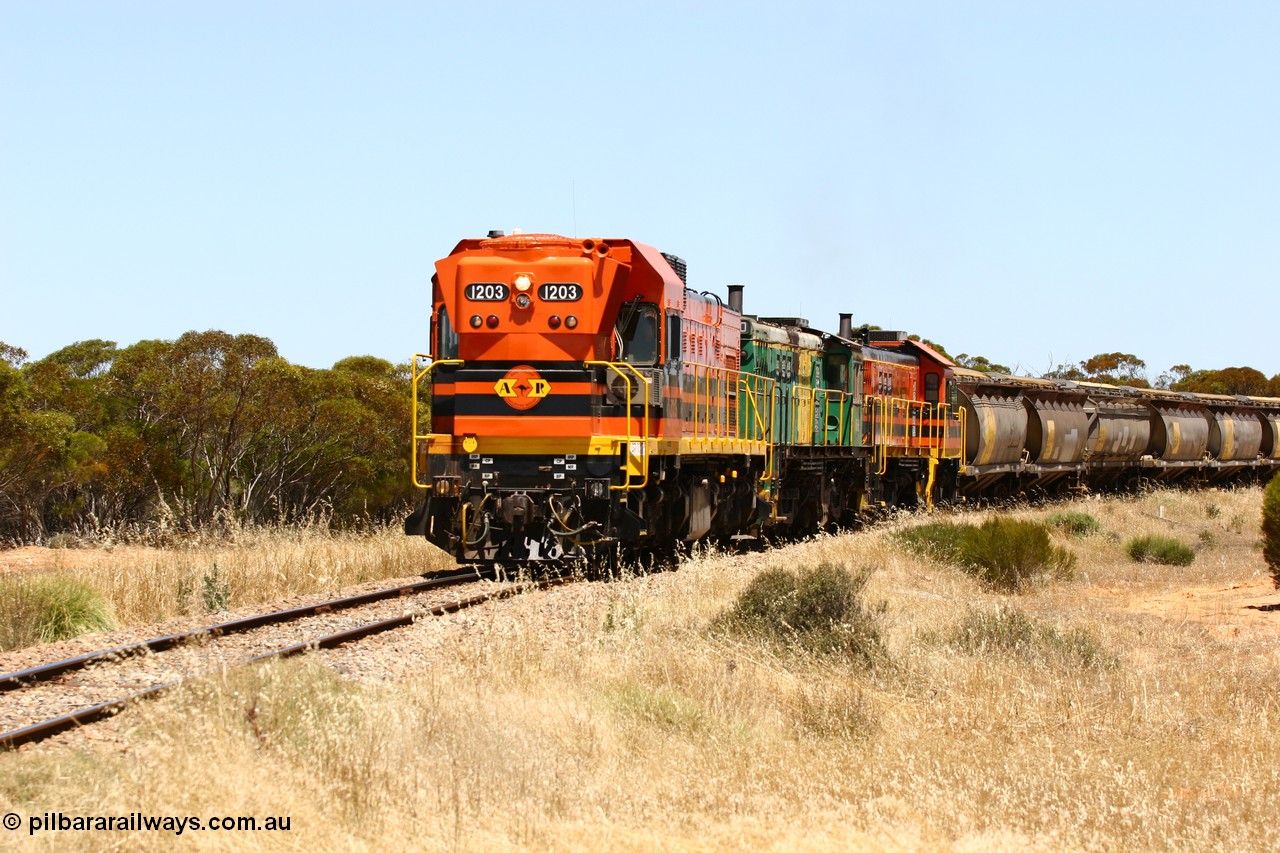 060111 2283
Murdinga, rounding the curve before entering the station environs empty grain train running north behind ARG 1200 class unit 1203, a Clyde Engineering EMD model G12C serial 65-427, one of fourteen originally built between 1960-65 for WAGR as their A class A 1513, fitted with dynamic brakes and financed by Western Mining Corporation, started working on the Eyre Peninsula in November 2004. 11th January 2006.
Keywords: 1200-class;1203;Clyde-Engineering-Granville-NSW;EMD;G12C;65-427;A-class;A1513;