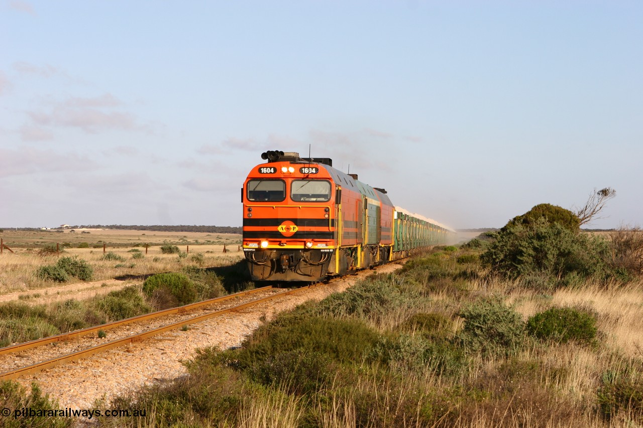 060113 2416
Ceduna, loaded gypsum train 6DD2 powers along the grades outside of town behind the triple 1600 / NJ class combination of 1604, NJ 3 and 1601 at 08:10 AM on the Friday the 13th January 2006.
Keywords: 1600-class;1604;71-731;Clyde-Engineering-Granville-NSW;EMD;JL22C;NJ-class;NJ4;