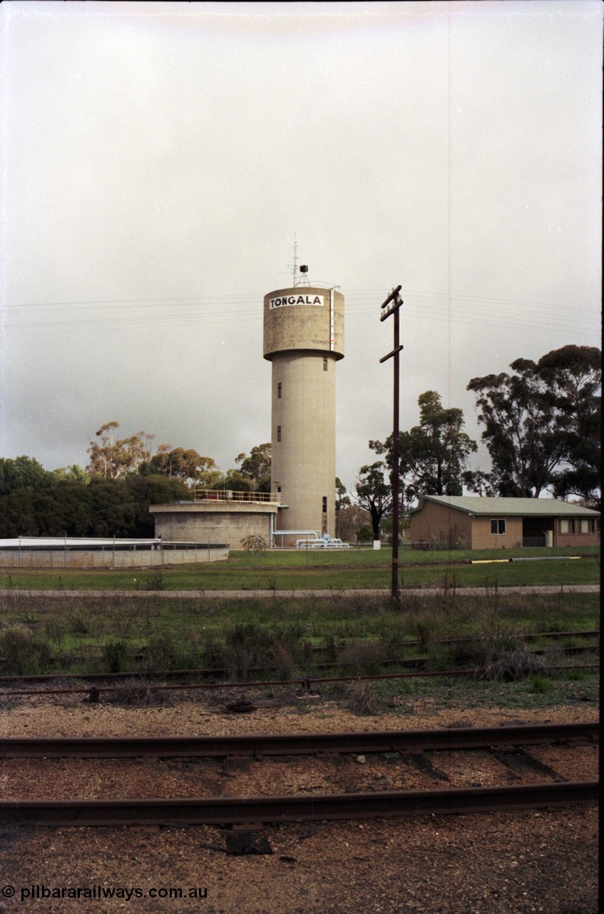 107-14
Tongala town concrete water tower and treatment plant, taken from station yard.
