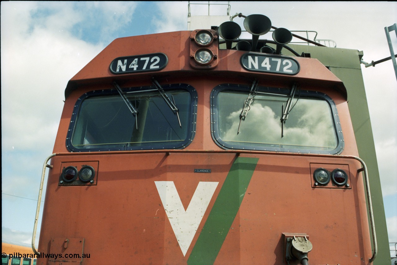 117-22
Seymour loco depot, fuel and sanding point, V/Line N class N 472 'City of Sale' Clyde Engineering EMD model JT22HC-2 serial 87-1201, front view of windscreens, Clarence name plate.
Keywords: N-class;N472;Clyde-Engineering-Somerton-Victoria;EMD;JT22HC-2;87-1201;