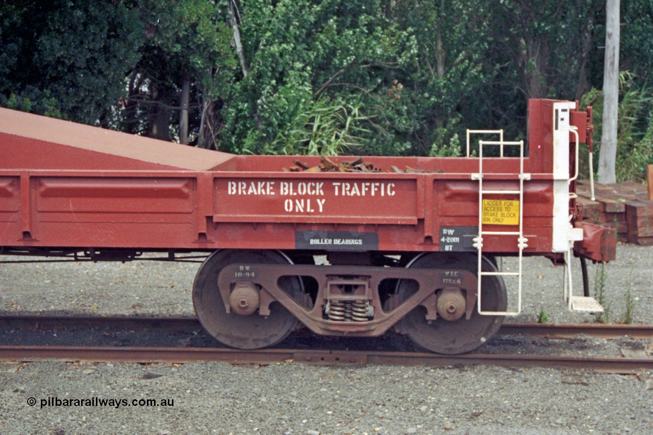 128-01
Ballarat yard, broad gauge V/Line VZBF type bogie brake block transport waggon VZBF 2, a 1990 conversion from what was originally an Victorian Railways BP type steel mail van BP 77 built in 1959 at Newport Workshops as part of a batch of eighty three. It went on to be recoded to BB 222 in December 1960, then BMF 2 in December 1961, BMX 2 in February 1968, recoded to VBAX in 1979, then in 1990 converted to the VZBF along with two other waggons as a group of three. Hand brake end view.
Keywords: VZBF-type;VZBF2;Victorian-Railways-Newport-WS;BP-type;BP77;BB-type;BB222;BMF-type;BMF2;BMX-type;BMX2;VBAX-type;VBAX2;