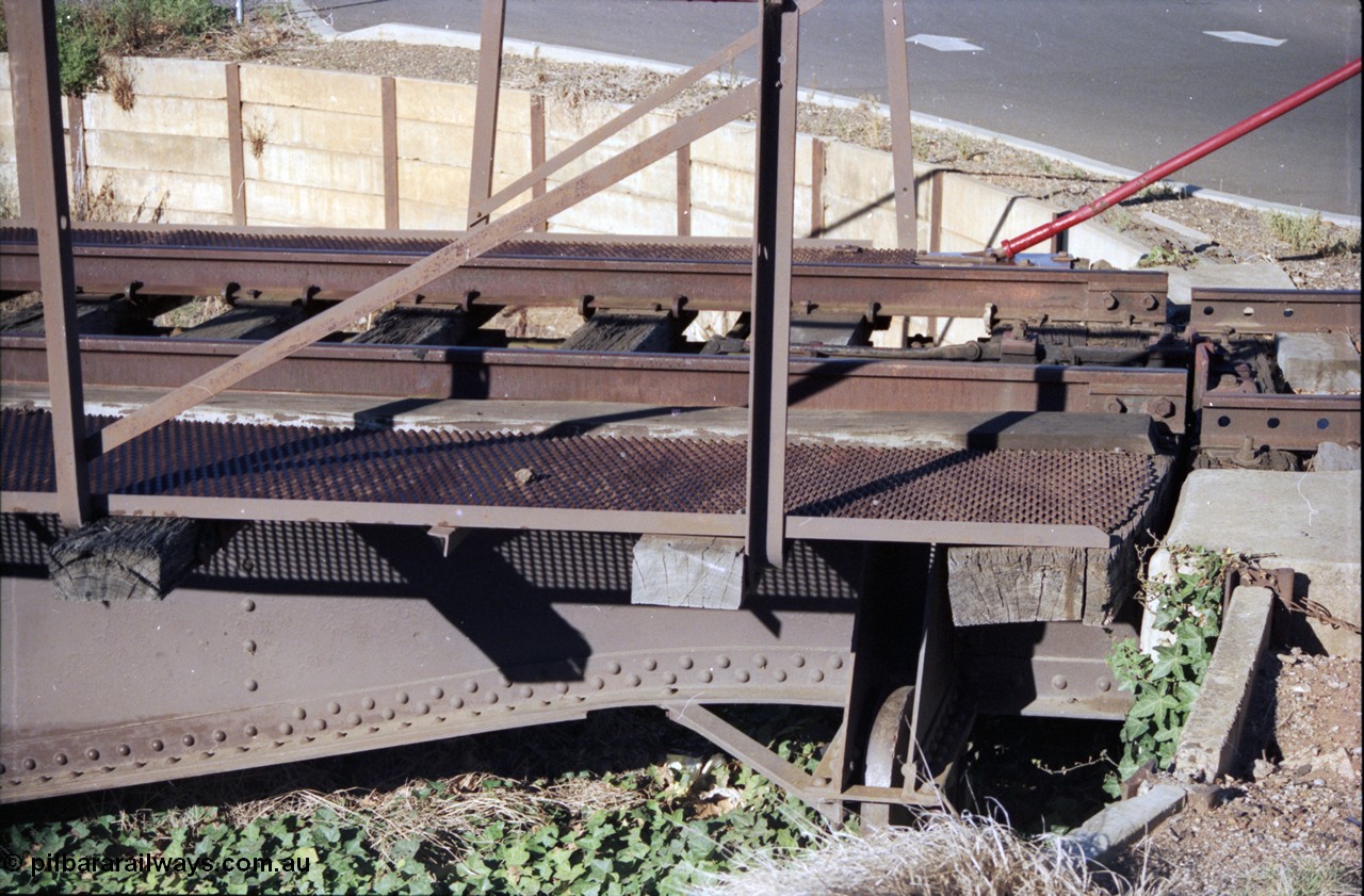 153-1-21
Bacchus Marsh turntable looking at non-lever end interlock and side, shows walkway and underframe.
