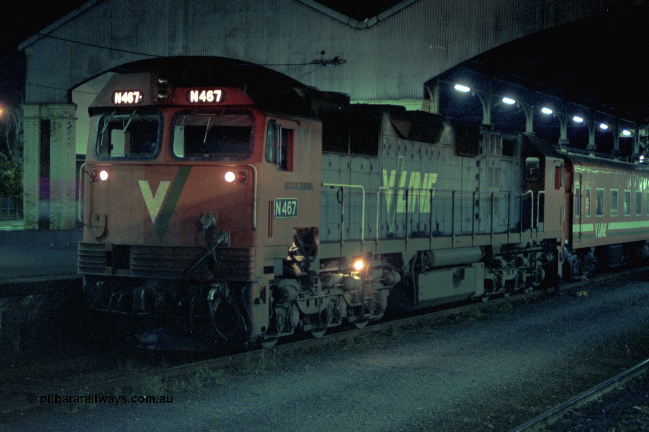 153-3-20
Geelong station building and platform, night shot, V/Line broad gauge N class N 467 'City of Stawell' Clyde Engineering EMD model JT22HC-2 serial 86-1196 with a 5 car N set.
Keywords: N-class;N467;Clyde-Engineering-Somerton-Victoria;EMD;JT22HC-2;86-1196;