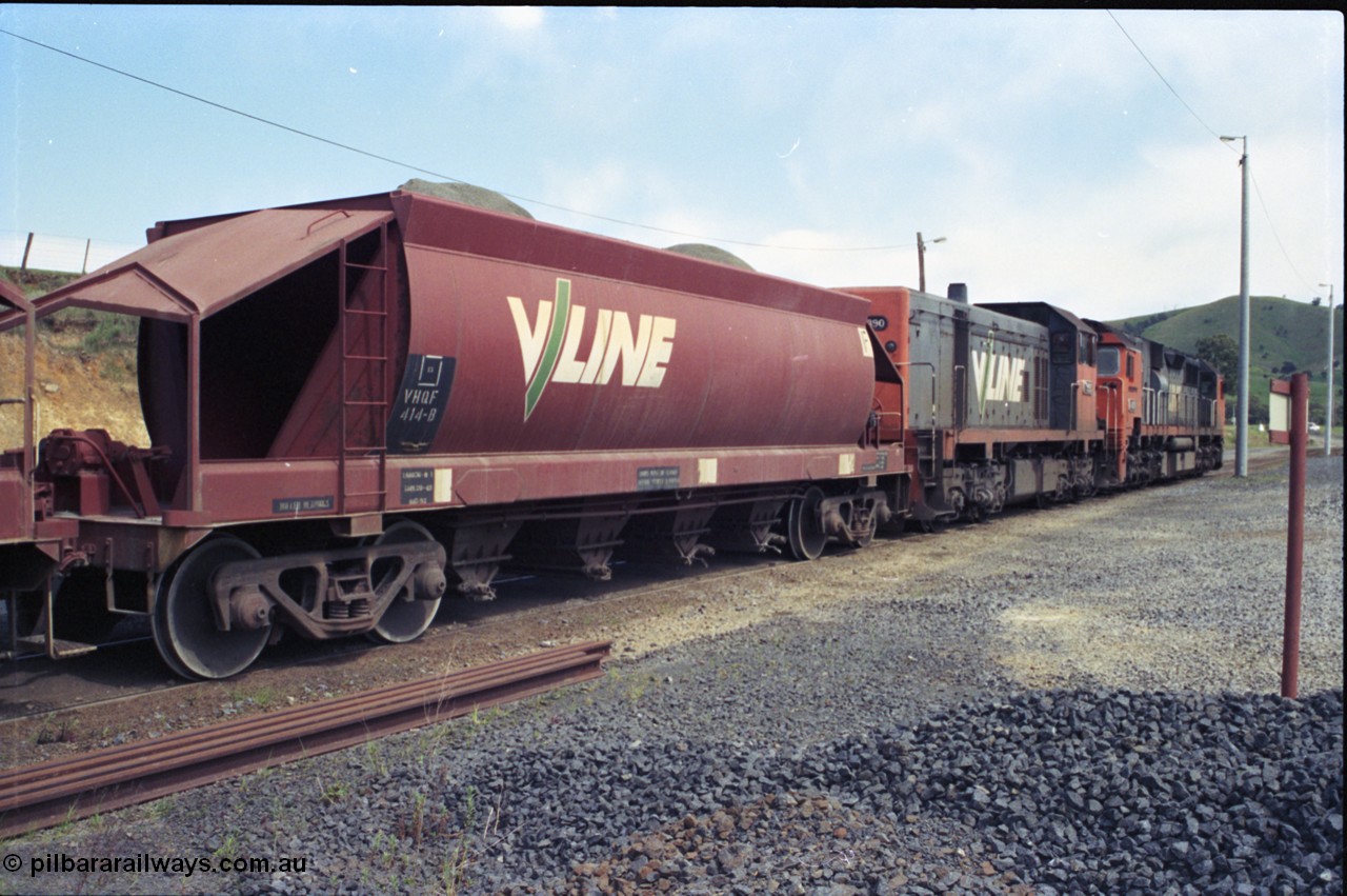 157-24
Kilmore East, Apex Quarry Siding, V/Line VHQF type bogie quarry products waggon VHQF 414 originally built by Ballarat North Workshops in February 1977 as JQF type, to VHQY in 1979 and VHQF in 1988, trailing view taken from ballast pile.
Keywords: VHQF-type;VHQF414;Victorian-Railways-Ballarat-Nth-WS;JQF-type;VHQY-type;