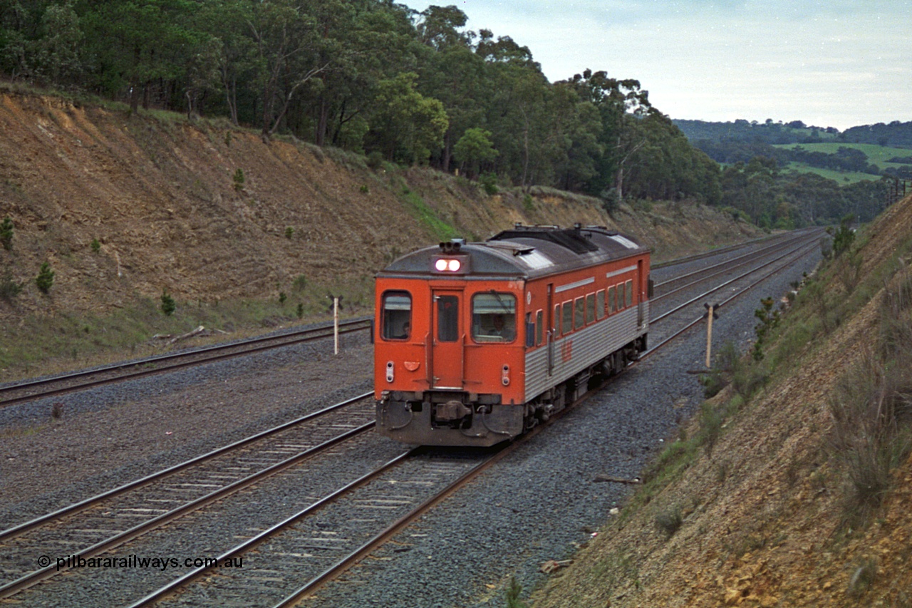 166-19
Heathcote Junction, down V/Line broad gauge passenger service to Seymour consisting of Tulloch Ltd built DRC class diesel rail car climbing up hill to the summit.
Keywords: DRC-class;Tulloch-Ltd-NSW;