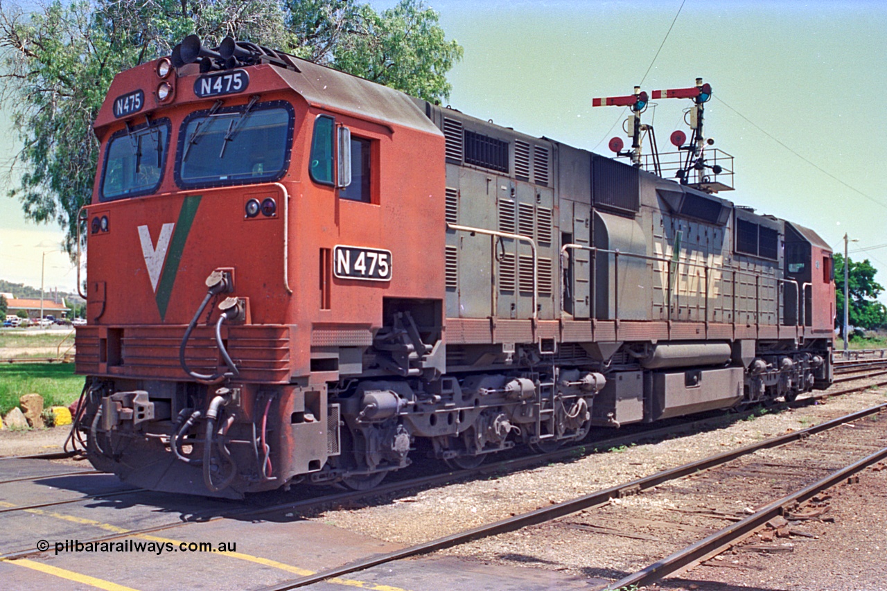180-24
Wodonga, the last member of V/Line broad gauge N class fleet, N 475 'City of Moe' Clyde Engineering EMD model JT22HC-2 serial 87-1204 stands near the signal box shut down having bought the morning down passenger service from Melbourne.
Keywords: N-class;N475;Clyde-Engineering-Somerton-Victoria;EMD;JT22HC-2;87-1204;
