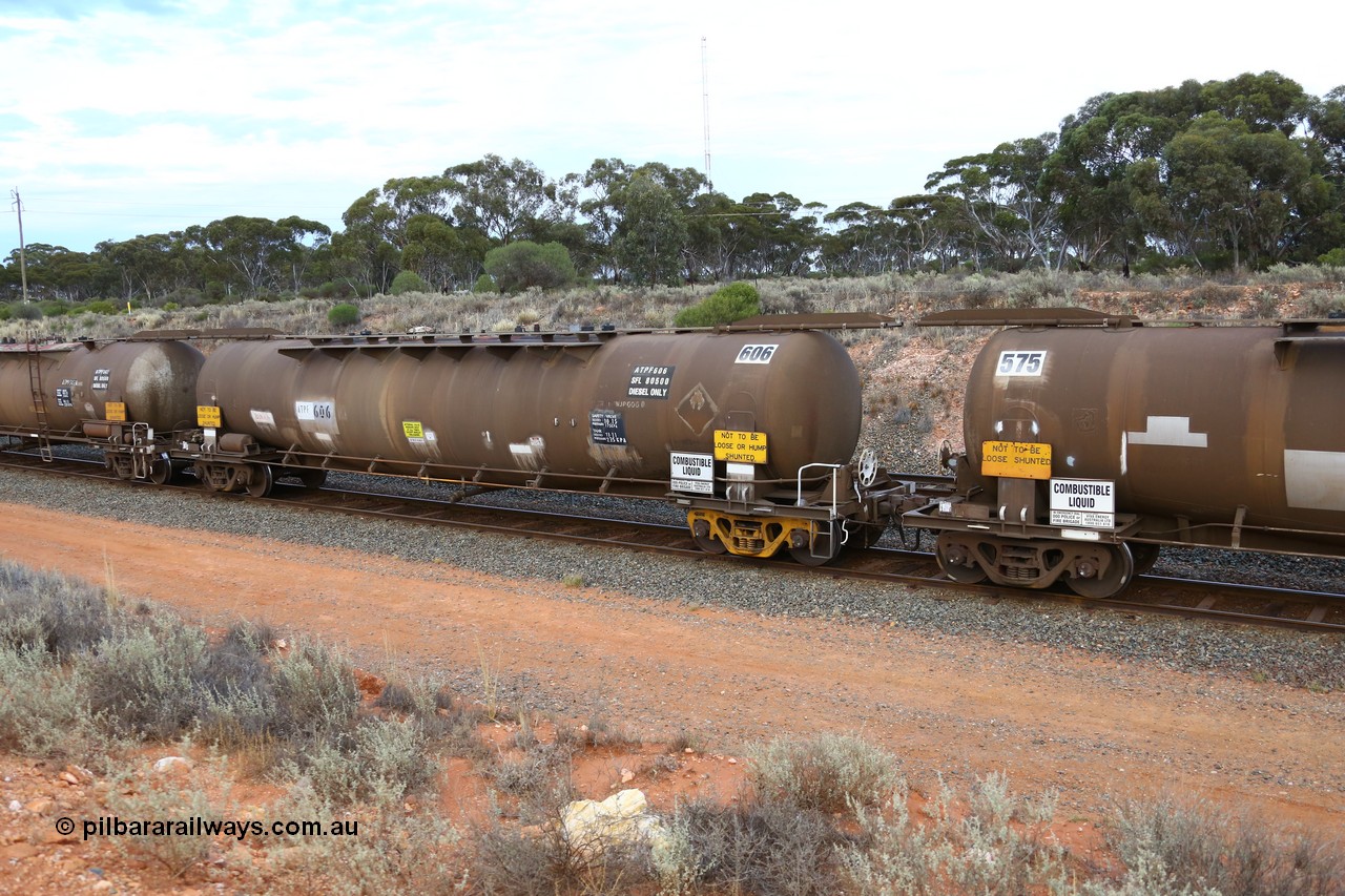 161116 5103
West Kalgoorlie, Shell fuel train 3442, tank waggon ATPF 606, built by Westrail Midland Workshops 1982 for Shell as type WJP 80.66 kL one compartment one dome.
Keywords: ATPF-type;ATPF606;Westrail-Midland-WS;WJP-type;