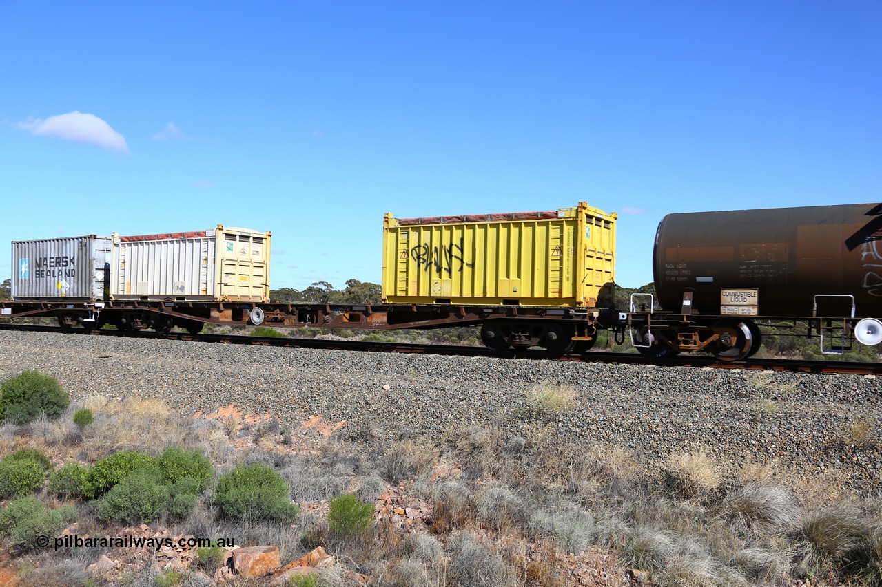 161111 2483
Binduli, Kalgoorlie Freighter train 5025, container flat waggon AQWY 31024, built by Centrecon Ltd WA in 1981 in a batch of thirty five WFA type container waggons, another eighteen were also built by Westrail. In 1987 it was converted to WFAP for motor vehicle transport, loaded here with two 20' 2CU0 type roll top containers CODU 006128 and CODU 006123, both with Aurizon decals.
Keywords: AQWY-type;AQWY31024;Centrecon-Ltd-WA;WFA-type;WFAP-type;