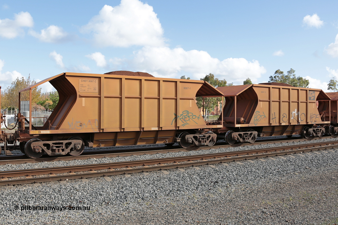140601 4609
Midland, loaded iron ore train #1030 heading to Kwinana, CFCLA leased CHEY type waggon CHEY 8067 one pair of 120 bar coupled pairs built by Bluebird Rail Operations SA in 2011-12. 1st June 2014.
Keywords: CHEY-type;CHEY8067;Bluebird-Rail-Operations-SA;2011/120-67;