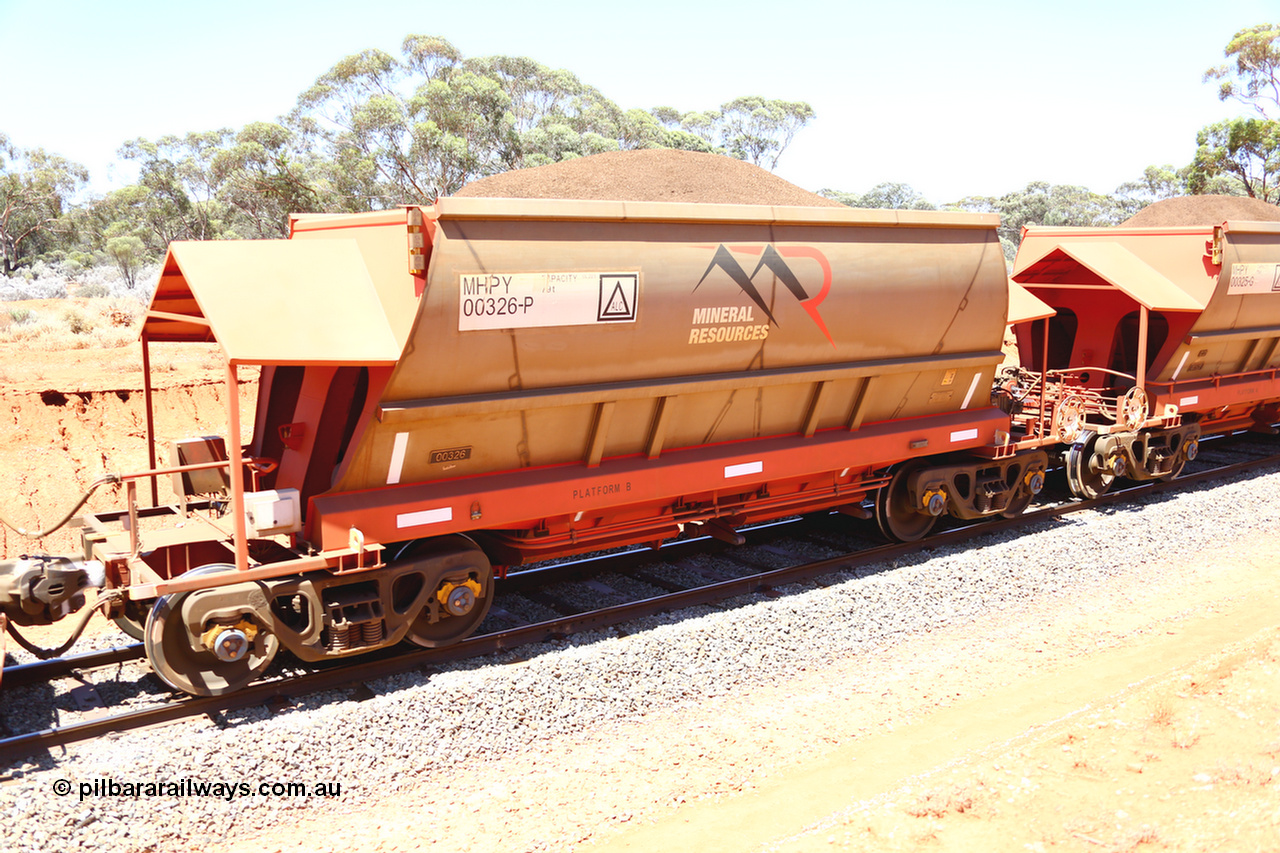 190129 4259
Binduli, on Mineral Resources Ltd loaded iron ore train service from Koolyanobbing to Esperance #3033 with MRL's MHPY type iron ore waggon MHPY 00326 built by CSR Yangtze Co China serial 2014/382-326 in 2014 as a batch of 382 units, these bottom discharge hopper waggons are operated in 'married' pairs.
Keywords: MHPY-type;MHPY00326;2014/382-326;CSR-Yangtze-Co-China;