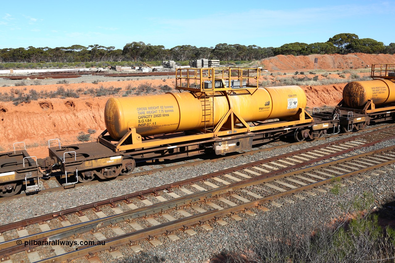 160523 3327
West Kalgoorlie, AQHY 30051 with CSA 0111, originally built by the WAGR Midland Workshops in 1964/66 as a WF type flat waggon, then in 1997, following several recodes and modifications, was one of seventy five waggons converted to the WQH to carry CSA sulphuric acid tanks between Hampton/Kalgoorlie and Perth. CSA 0111 was built by Vcare Engineering, India for Access Petrotec & Mining Solutions in 2015.
Keywords: AQHY-type;AQHY30051;WAGR-Midland-WS;WF-type;WFDY-type;WFDF-type;RFDF-type;WQH-type;