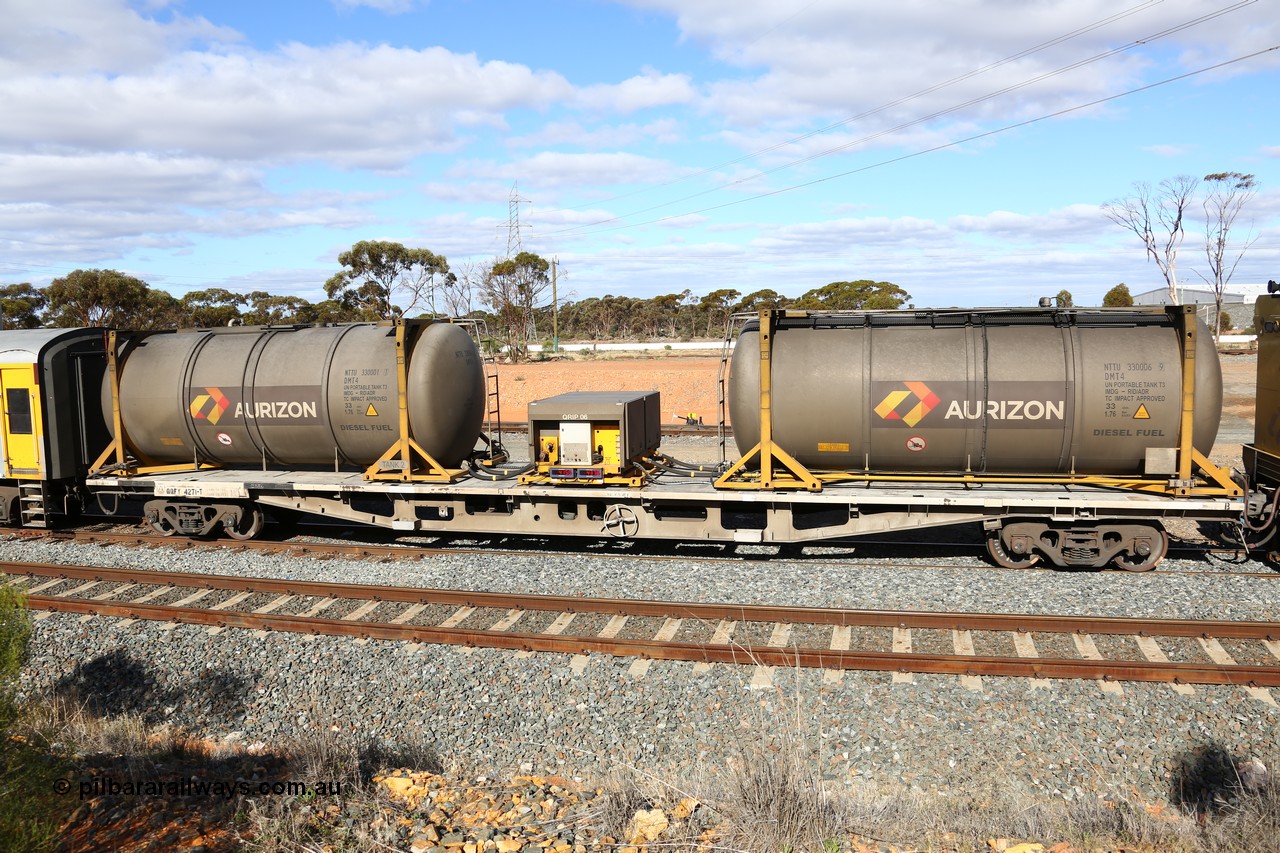 160525 4946
West Kalgoorlie, Aurizon intermodal train 2MP1. Inline fuelling waggon QQFY 4271, originally built for Commonwealth Railways in 1976 by Perry Engineering SA as type RMX, recoded to AQMX, 70 tonne bogies became AQMY, then RQMY, to QR National in 2007. Seen here with two 30' diesel fuel tanktainers from Nantong Tank Container Company, NTTU 330006 and NTTU 330001 each with a 30800 litre capacity, and fuel transfer or pump unit QRIP 06.
Keywords: QQFY-type;QQFY4271;Perry-Engineering-SA;RMX-type;AQMX-type;AQMY-type;RQMY-type;