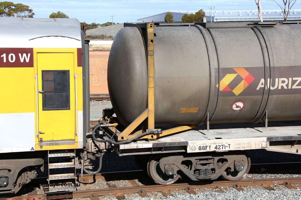 160525 4952
West Kalgoorlie, Aurizon intermodal train 2MP1. Inline fuelling waggon QQFY 4271, originally built for Commonwealth Railways in 1976 by Perry Engineering SA as type RMX, recoded to AQMX, with 70 tonne bogies became AQMY, then RQMY, to QR National in 2007. Seen here with a 30' diesel fuel tanktainer from Nantong Tank Container Company, NTTU 330001 with a 30800 litre capacity. The Perry Engineering plate is also visible.
Keywords: QQFY-type;QQFY4271;Perry-Engineering-SA;RMX-type;AQMX-type;AQMY-type;RQMY-type;