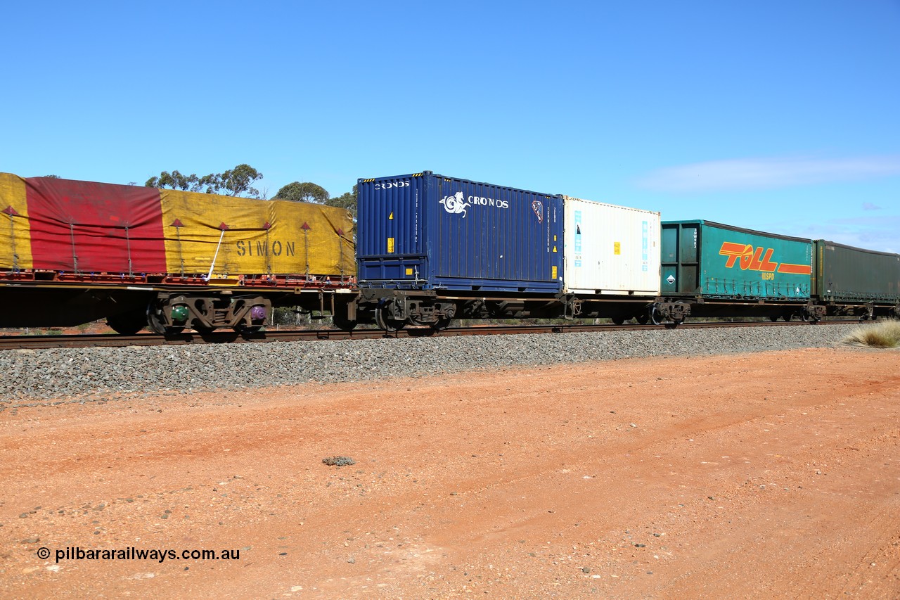 160528 8404
Binduli, intermodal train 6PM6, RRQY 8331 articulated five-unit container waggon built by Qiqihar Rollingstock Works in China in an order of forty one units in 2005/06 for Pacific National. Platforms 1 and 2 with a 20' Cronos bulker box 2EB0 type TSPD 122208 and Royal Wolf 20' 25G1 type RWPU 200971 and Toll-SPD 40' curtain sider 3NW 983.
Keywords: RRQY-type;RRQY8331;Qiqihar-Rollingstock-Works-China;