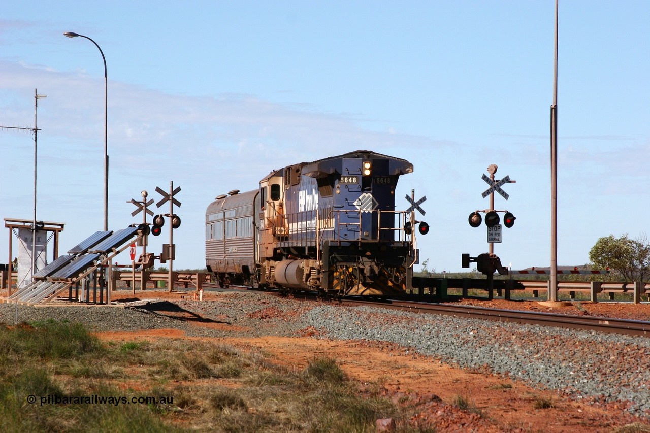 050625 3768
Broome Rd grade crossing at the 57.1 km on the GML sees BHP Goninan GE rebuilt model CM40-8M unit 5648 'Kwangyang Bay' serial 8412-06 / 93-139 long end leading the Sundowner on its way back to Hedland across the highway 25th June 2005.
Keywords: 5648;Goninan;GE;CM40-8M;8412-06/93-139;rebuild;AE-Goodwin;ALCo;M636C;5477;G6047-9;
