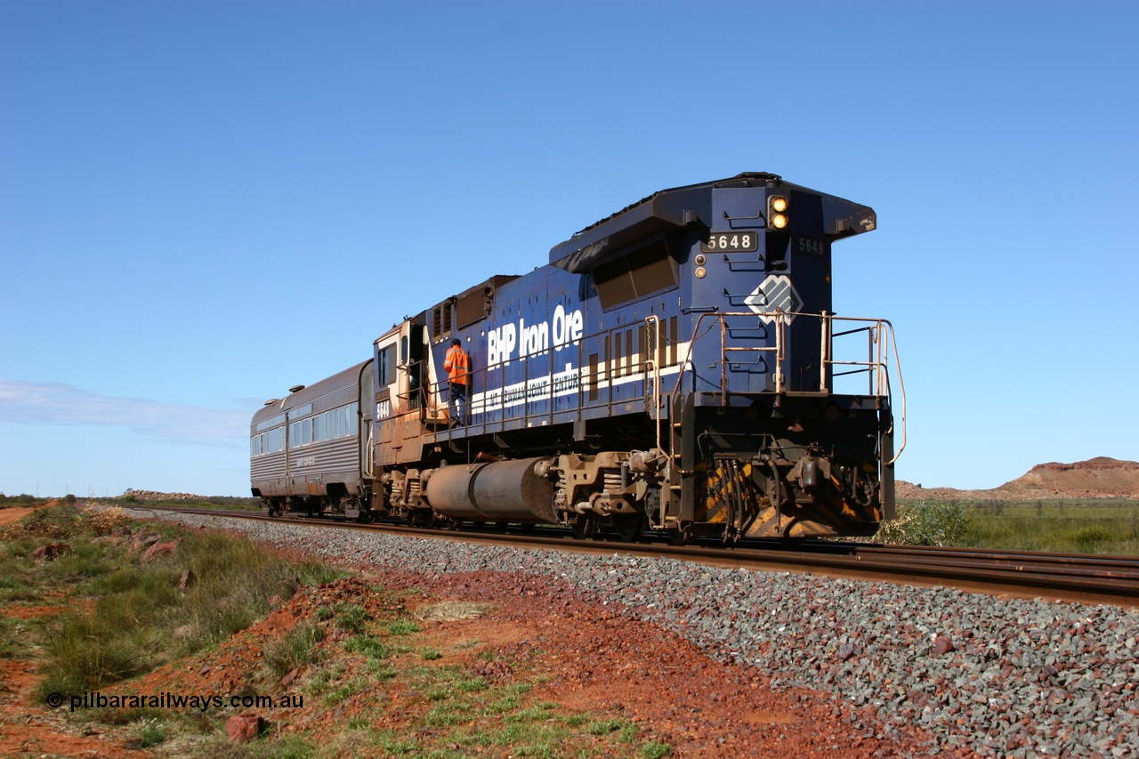 050625 3784
Allan Siding, at the 51 km just east of Node 3 on the GML sees BHP Goninan GE rebuilt model CM40-8M unit 5648 'Kwangyang Bay' serial 8412-06 / 93-139 long end leading the Sundowner waiting for an empty train to pull in clear into the siding on its way back to Hedland 25th June 2005.
Keywords: 5648;Goninan;GE;CM40-8M;8412-06/93-139;rebuild;AE-Goodwin;ALCo;M636C;5477;G6047-9;