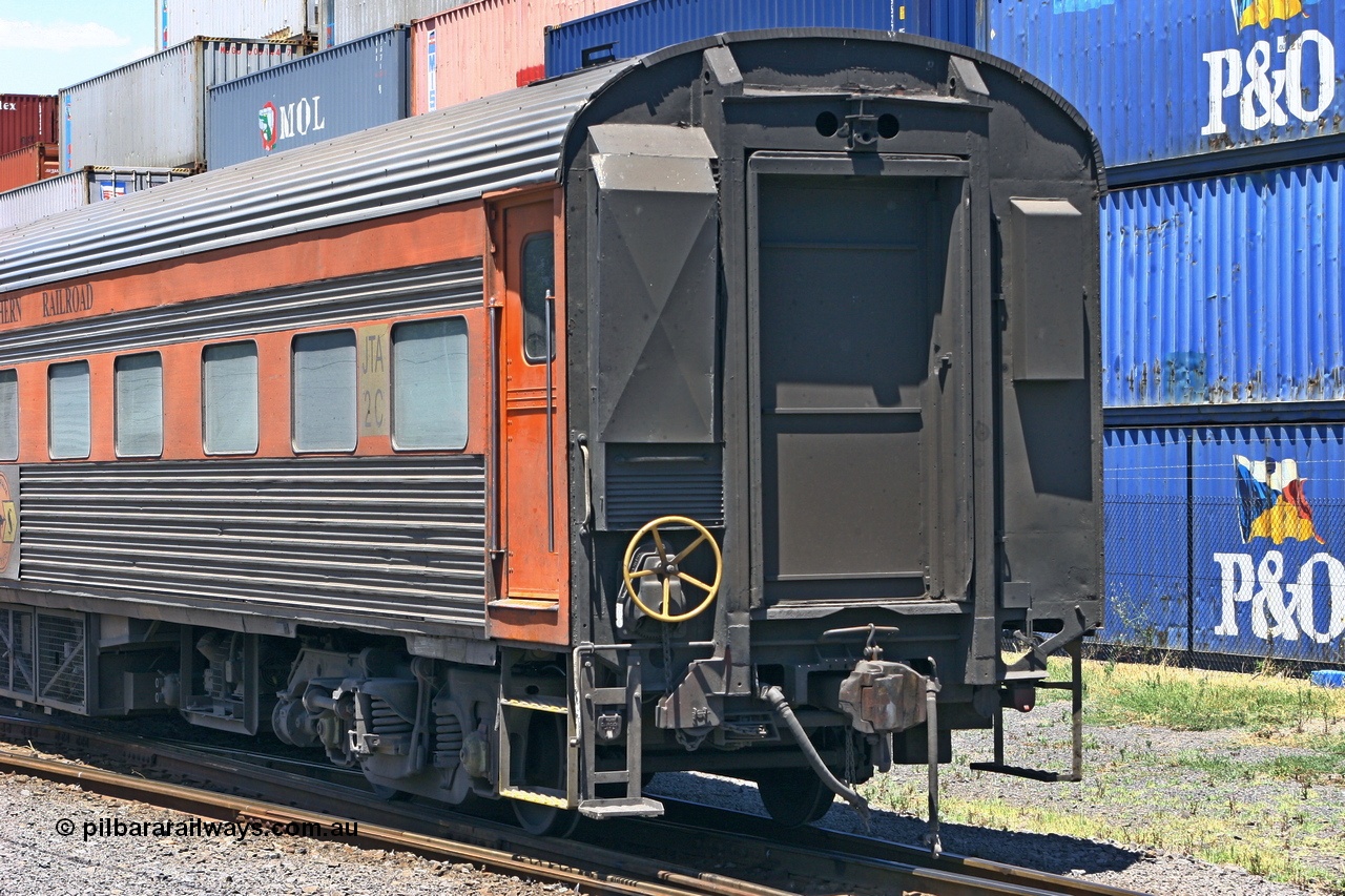 051230 1038
Melbourne, Australian Southern Railroad JTA type crew accommodation coach JTA 2, originally built in 1951 by SAR Islington Workshops as corten steel V&SAR Joint Stock twinette sleeping car Mokai for The Overland. Recoded to JTA 2 in 1987. Written off and sold in 1995. Converted to ASR crew car 1999? Converted to GWA liveried ADFY 7 in 2014.
Keywords: JTA-type;JTA2;SAR-Islington-WS;Mokai;