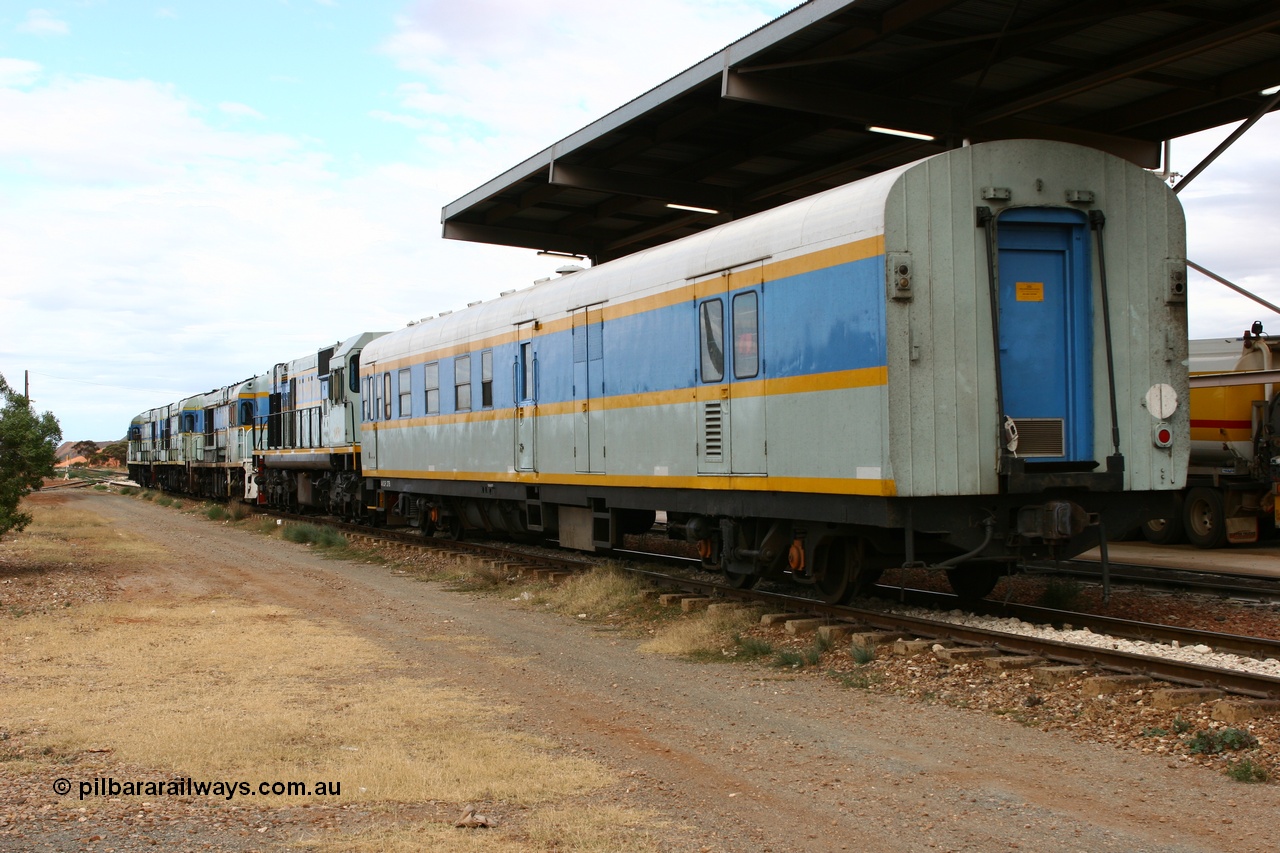 060529 4719
Parkeston, South Spur Rail AVDP type crew accommodation coach AVDP 277, built for the Commonwealth Railways by Comeng NSW as a brake van with sleeping accommodation as HRD type HRD 277 in 1971, modified for relay working in 1977, recoded to AVDY in 1983, then in 2002 leased for MurrayLander service before being sold to South Spur Rail and in this livery from mid 2005.
Keywords: AVDP-type;AVDP277;Comeng-NSW;HRD-type;HRD277;AVDY-type;