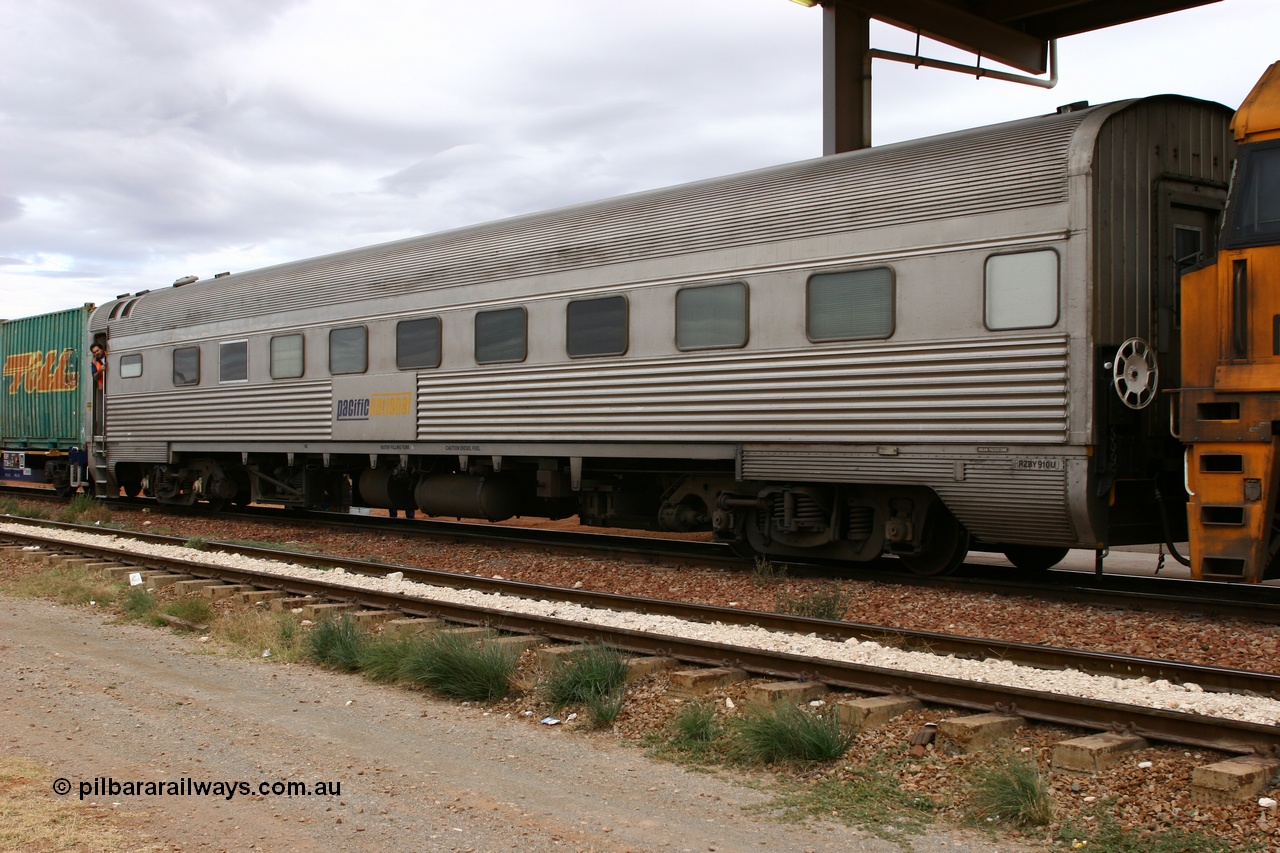 060529 4731
Parkeston, Pacific National RZBY type crew accommodation car RZBY 910 on train 6WP2, built by Comeng NSW as ER type stainless steel air conditioned crew dormitory car ER 210 in 1969, renumbered to ER 911 in 1974, sold to National Rail and converted to crew car in 1997.
Keywords: RZBY-type;RZBY910;Comeng-NSW;ER-type;ER210;ER910;