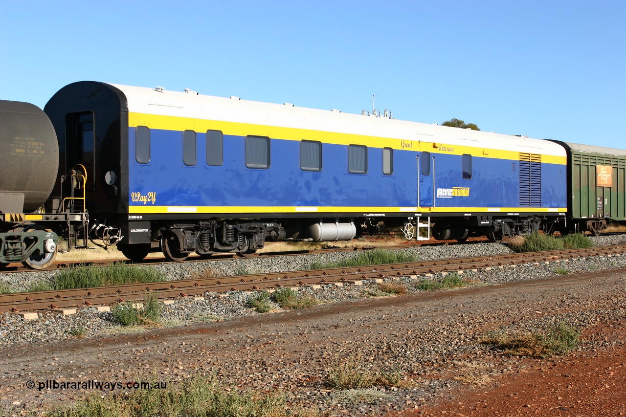 060530 4842
Parkeston, SCT VPAY type crew accommodation car VPAY 2 'Great Artesian' on train 2PM9, built by Tulloch Ltd NSW in 1968 as a narrow gauge brake van with sleeping accommodation as NHRD type NHRD 79, converted to standard gauge in 1981 and coded HRD type HRD 361. Recoded to AVDY in October 1982, then to AVDP. Sold to WCR, then in October 2000 overhauled for crew car use and coded VPAY 1 on SCT services and owned by Freight Australia. Was later sold to Pacific National and subsequently scrapped 2016.
Keywords: VPAY-type;VPAY2;Tulloch-Ltd-NSW;NHRD-type;NHRD79;HRD-type;HRD361;AVDY-type;AVDP-type;