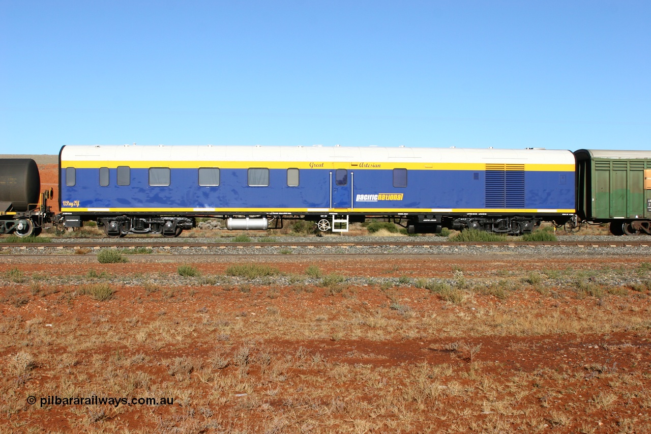 060530 4844
Parkeston, SCT VPAY type crew accommodation car VPAY 2 'Great Artesian' on train 2PM9, built by Tulloch Ltd NSW in 1968 as a narrow gauge brake van with sleeping accommodation as NHRD type NHRD 79, converted to standard gauge in 1981 and coded HRD type HRD 361. Recoded to AVDY in October 1982, then to AVDP. Sold to WCR, then in October 2000 overhauled for crew car use and coded VPAY 1 on SCT services and owned by Freight Australia. Was later sold to Pacific National and subsequently scrapped 2016.
Keywords: VPAY-type;VPAY2;Tulloch-Ltd-NSW;NHRD-type;NHRD79;HRD-type;HRD361;AVDY-type;AVDP-type;