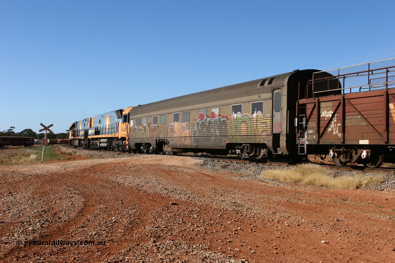 060530 4893
Parkeston, Pacific National RZAY type crew accommodation car RZAY 940 on train 2PM6 was built by Comeng NSW as an ARJ type stainless steel air conditioned first class roomette sleeping car ARJ 240 in 1968, allocated to the Indian Pacific Joint Stock in 1970, renumbered to ARJ 940 in 1974 and sold to National Rail and converted to crew car in 1997.
Keywords: RZAY-type;RZAY940;Comeng-NSW;ARJ-type;ARJ240;ARJ940;