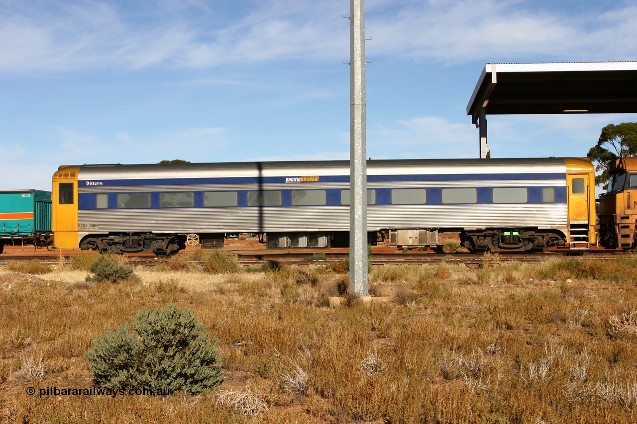 070527 9165
Parkeston; Pacific National RZDY type crew accommodation car RZDY 106 'Bittern' on train 6MP4 originally built by SAR Islington Workshops as a Bluebird railcar driving trailer in 1958 named 'Britten', in 1986 numbered 106, in 1990 converted to locomotive hauled and coded as BR type BR 106, written off in 1995 and sold off. In 1998 it was numbered 812. It was owned by a number of owners and then CFCLA. In 2006 converted to a Pacific National crew car.
Keywords: RZDY-type;RZDY106;SAR-Islington-WA;Bluebird;106;BR106;812;