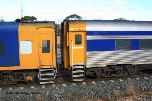 100601 8393
West Kalgoorlie, Pacific National BRS type crew accommodation coach BRS 221 coupled to RZEY 3. BRS 221was originally built by Victorian Railways Newport Workshops in November 1940 as an AS type first class sitting car for the Spirit of Progress as AS 6, in April 1983 converted to a combined sitting accommodation and a mini refreshment service as BRS type BRS 1, then in September 1985 renumbered to BRS 221. Sold to West Coast Railway mid 1990s, converted to crew car after 2004. RZEY 3, built by South Australian Railways Islington Workshops in 1956 as Tolkini for The Overland, renamed to Malkari in 1957 then coded JTA 3 in 1987, converted to crew coach in 2007 by Bluebird Rail Operations.
Keywords: BRS-type;BRS221;Victorian-Railways-Newport-WS;AS-type;AS6;BRS-type;BRS1;