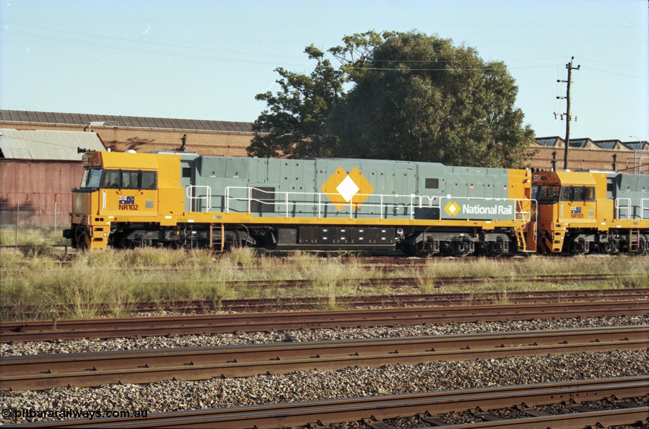 186-28
Midland, standard gauge yard, brand new Perth built National Rail NR class locomotive NR 102 Goninan GE model Cv40-9i serial 7250-07/97-302 leads sister NR 101 as they shunt into the yard off the mainline.
Keywords: NR-class;NR102;Goninan;GE;Cv40-9i;7250-07/97-302;