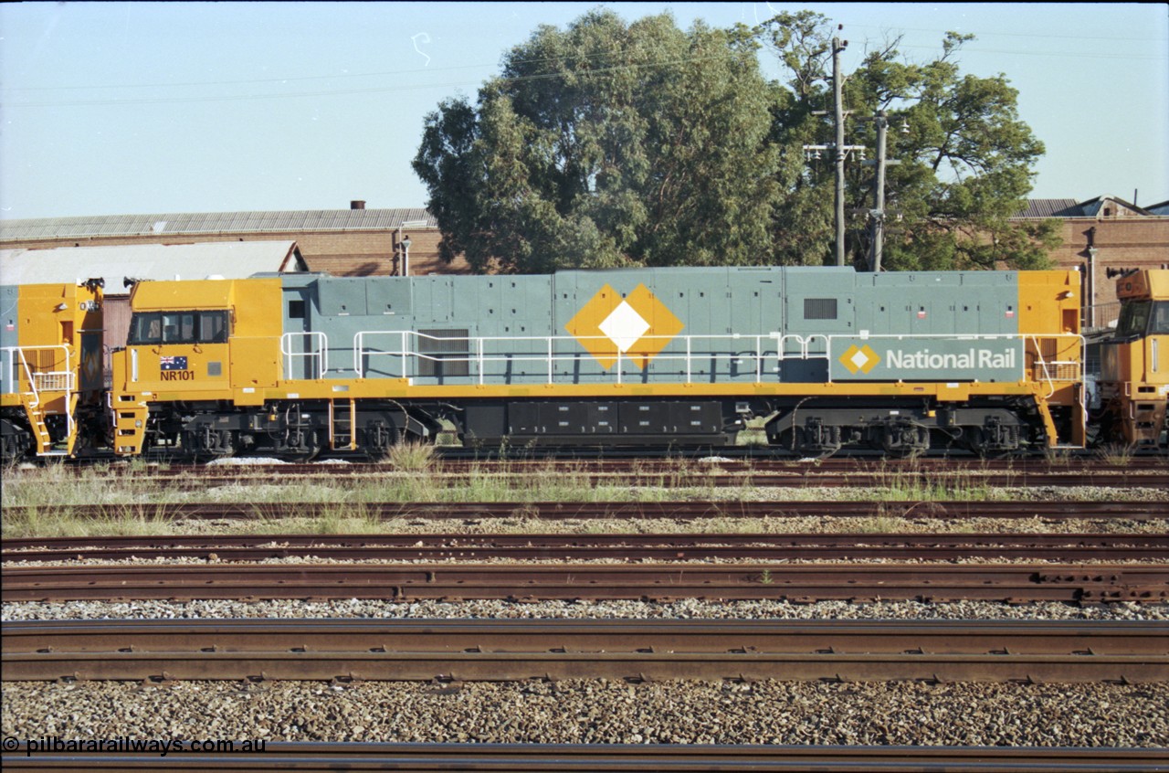 186-30
Midland, standard gauge yard, brand new Perth built National Rail NR class locomotive NR 101 Goninan built GE model Cv40-9i serial 7250-07/97-303 sits between sisters NR 101 and NR 61 as they undertake a shunting movement.
Keywords: NR-class;NR101;Goninan;GE;Cv40-9i;7250-07/97-303;