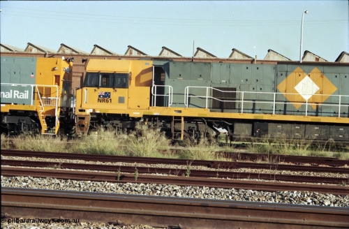 186-35
Midland, standard gauge yard, the first completed and built in Bassendean, National Rail NR class NR 61 Goninan GE model Cv40-9i serial 7250-11/96-263 trails new sister NR 101 in this drivers side shot.
Keywords: NR-class;NR61;Goninan;GE;Cv40-9i;7250-11/96-263;