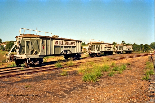 187-10
Monkland, Gympie Queensland. VMO type molasses waggon VMO 33440 and two others. Originally built by Nippon Sharyo Nihon in 1965 as a batch of 200 VO type coal hoppers. Converted to VMO in 1994. [url=https://goo.gl/maps/Fy4T98DMkxP2]GeoData[/url].
Keywords: VMO-type;VMO33440;Nippon-Sharyo-Nihon;VO-type;