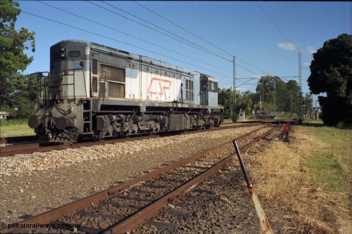 187-20
Beerwah, QR narrow gauge Comeng Qld built (under contract for Clyde Engineering) EMD model G22C unit 1505 serial 67-600 sits just north of Mawhinney St grade crossing. [url=https://goo.gl/maps/ug8czFZ4GjS2]GeoData[/url].
Keywords: 1502-class;1505;Comeng-Qld;EMD;GL22C;67-600;