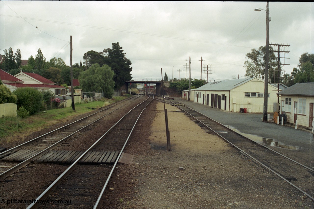 188-08
Wagga Wagga, located 521 km from Sydney on the NSW Main South, looking south from the platform past the maintenance of way buildings with Edmondson Street over bridge in the distance. Geo [url=https://goo.gl/maps/PJ9gfQrtLYn]Data[/url].
