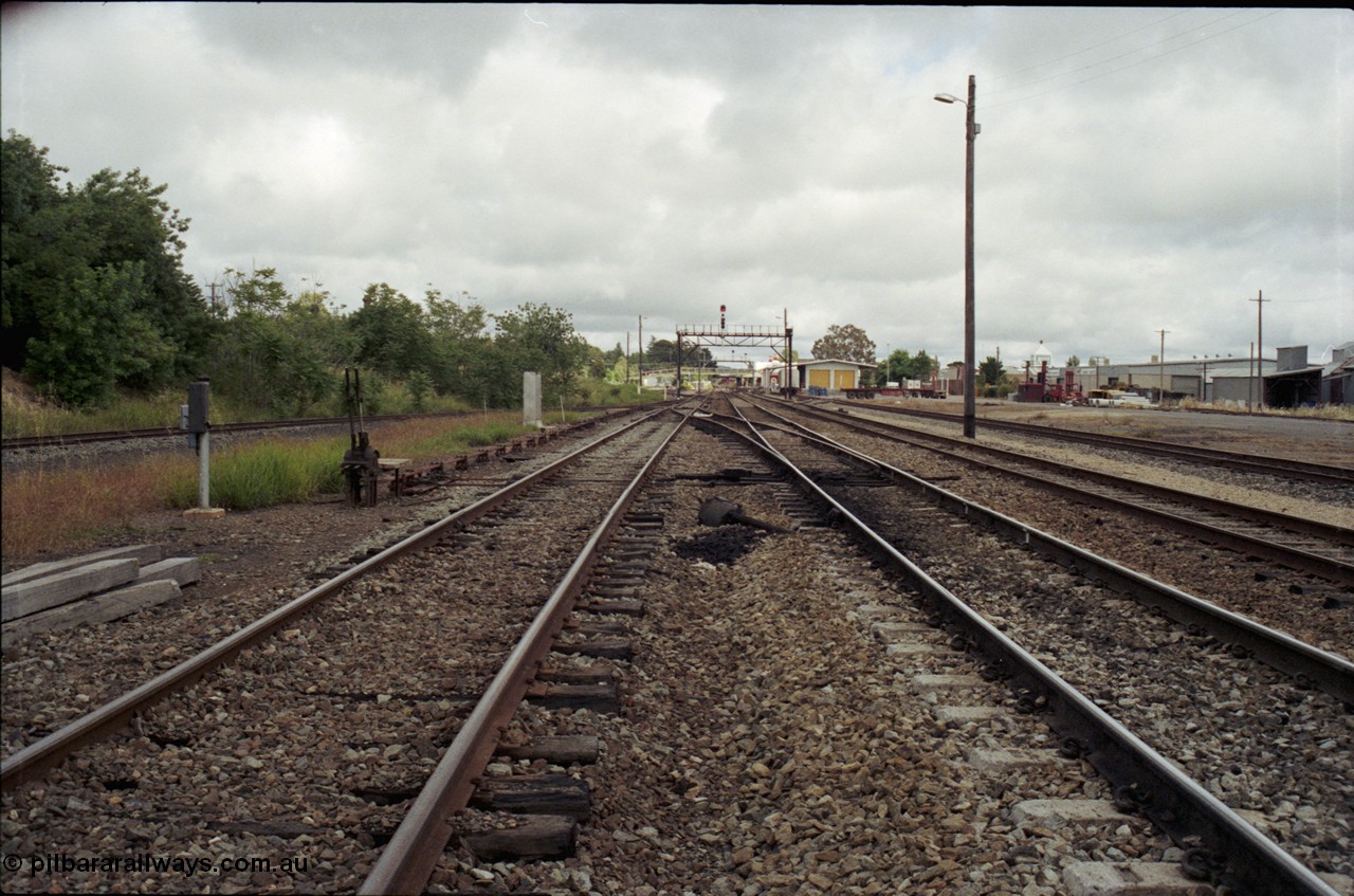 188-13
Wagga Wagga, located 521 km from Sydney on the NSW Main South, looking south from Frame C on the Tumbarumba branch line with the goods shed with yellow doors in the distance, the track at far left is the Loco Siding. Geo [url=https://goo.gl/maps/UvQTy2UvaU92]Data[/url].
