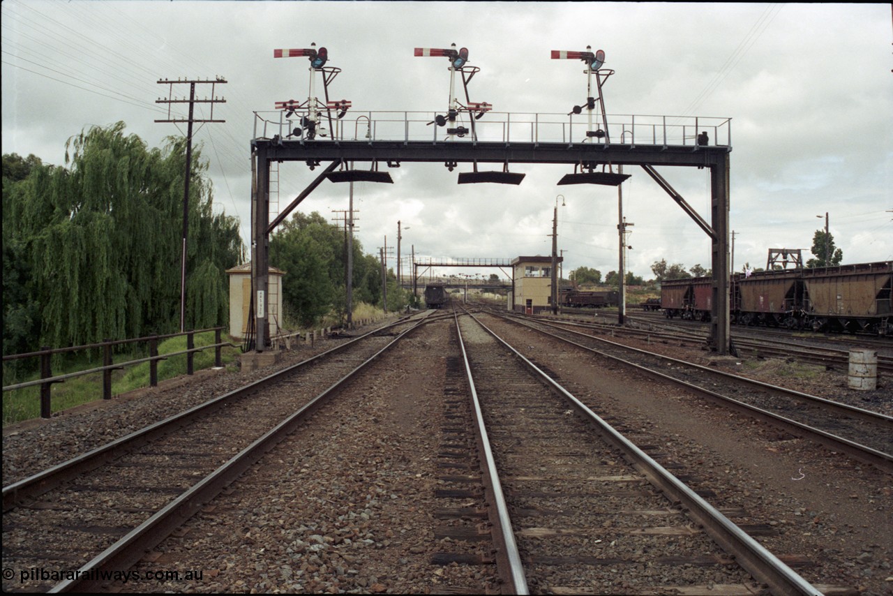 188-24
Junee, NSW Main South looking towards Albury along the middle road which becomes the mainline, the Down Shunting Neck is on the left, the signal bridge is at the 485.920 km.
