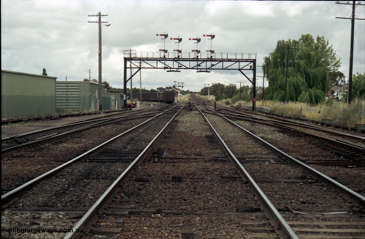 188-28
Junee, NSW Main South, looking north with the mainlines to Sydney running straight ahead and the former line to Hay and Old Junee curving away to the left.
